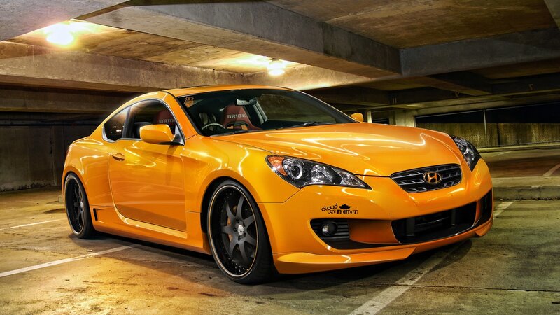 Orange Hyundai Coupe in Garage