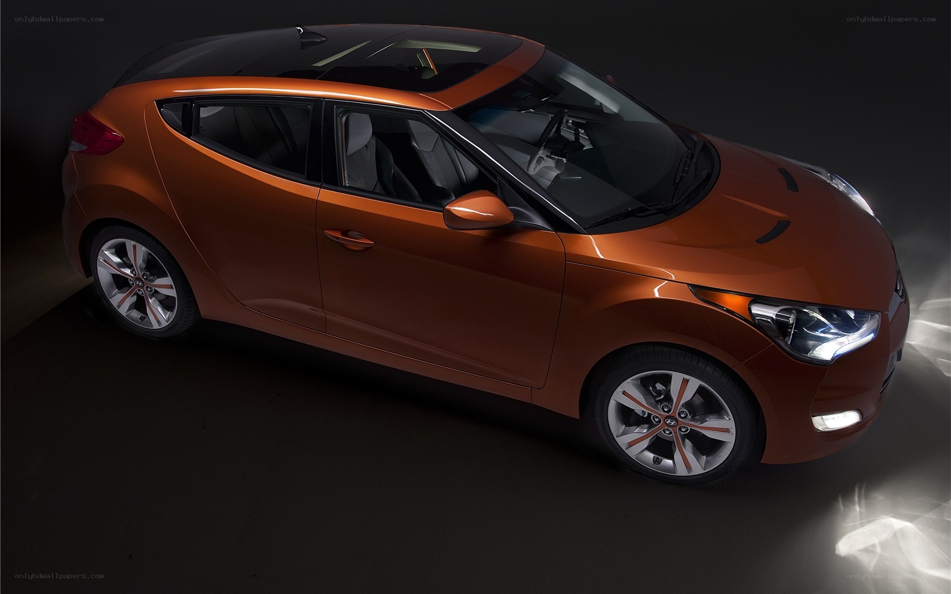 Orange Hyundai Veloster car