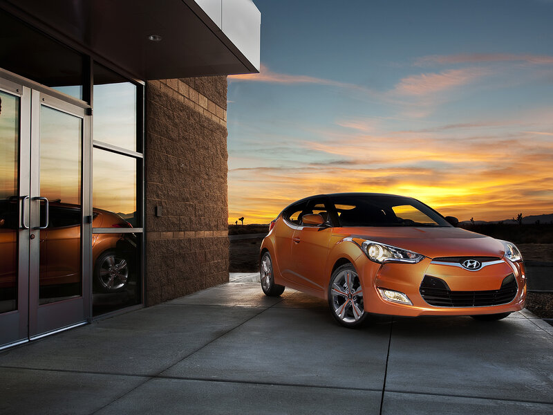 Orange Hyundai Veloster — Dramatic, Sunset