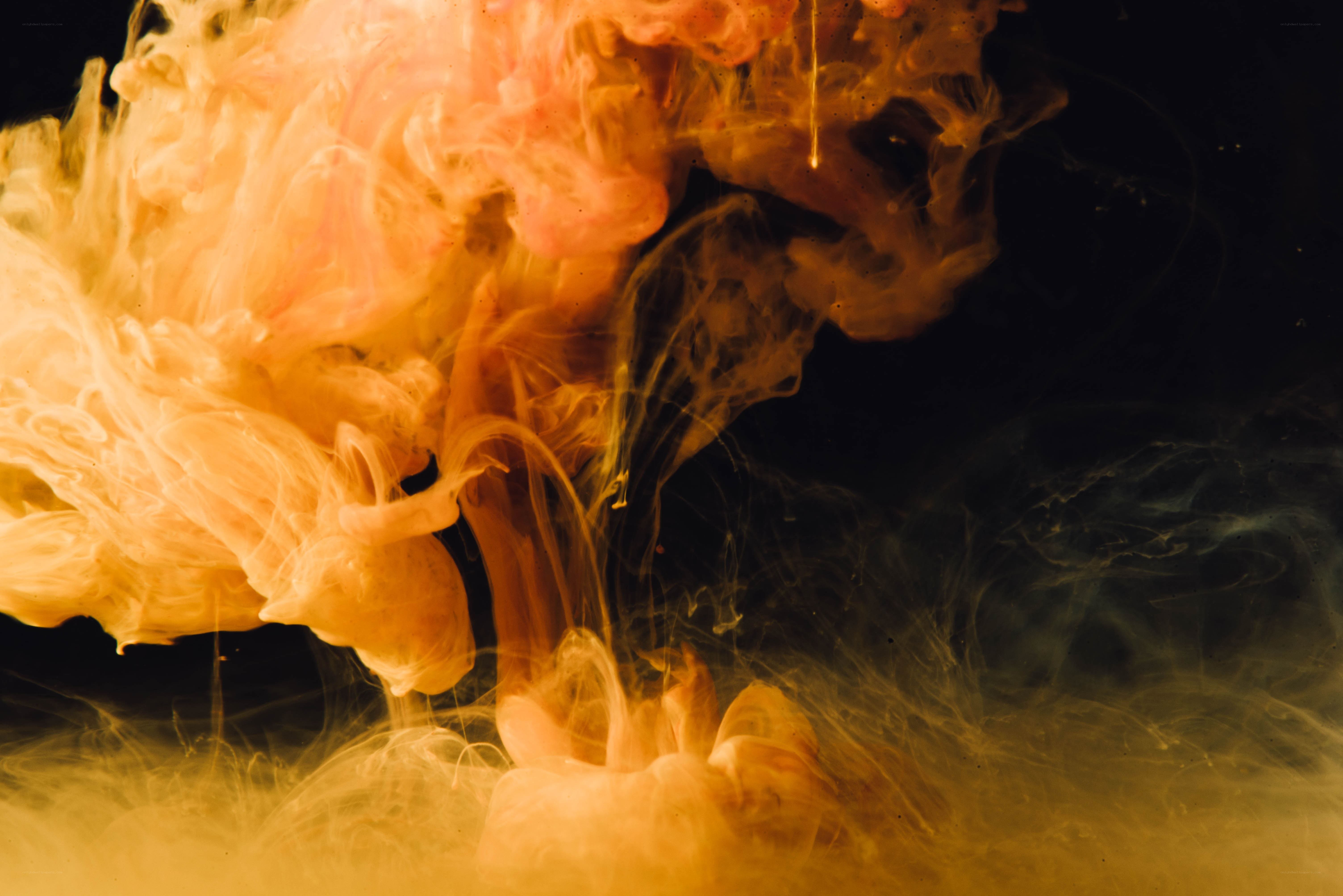 orange ink in water