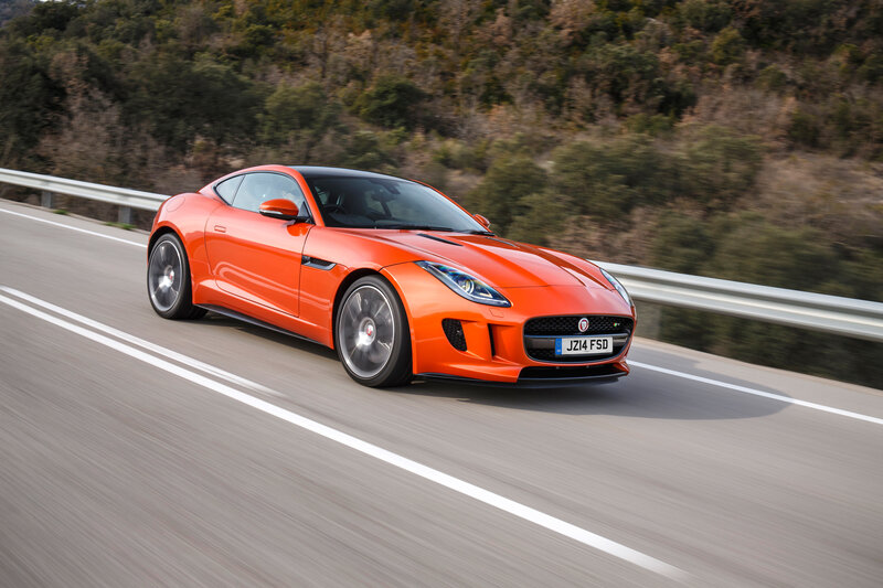 Orange Jaguar F-Type in motion