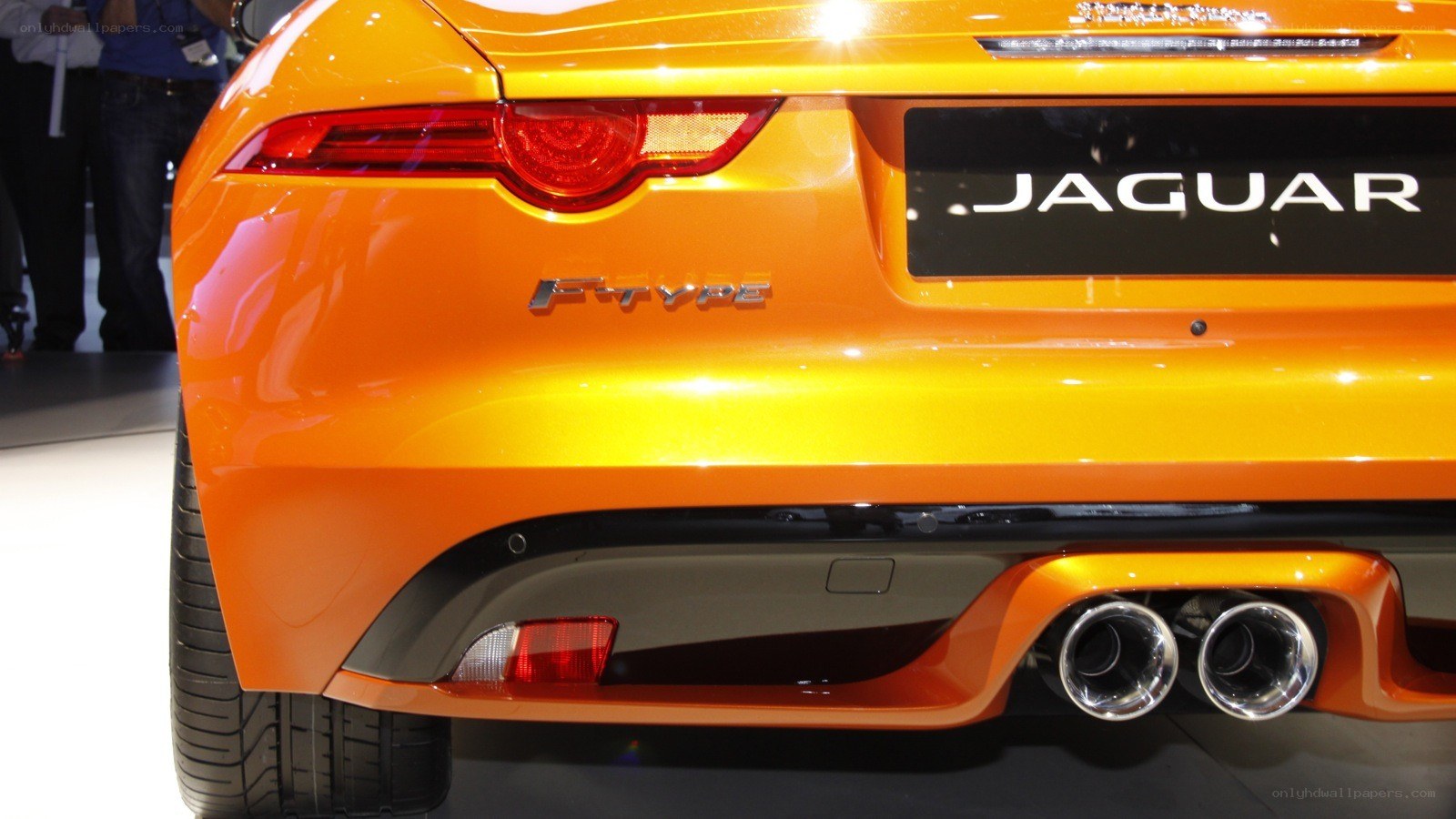 orange jaguar f-type rear view