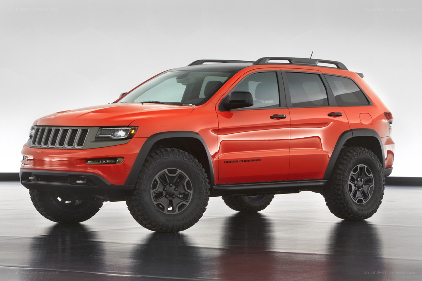 Orange Jeep Grand Cherokee