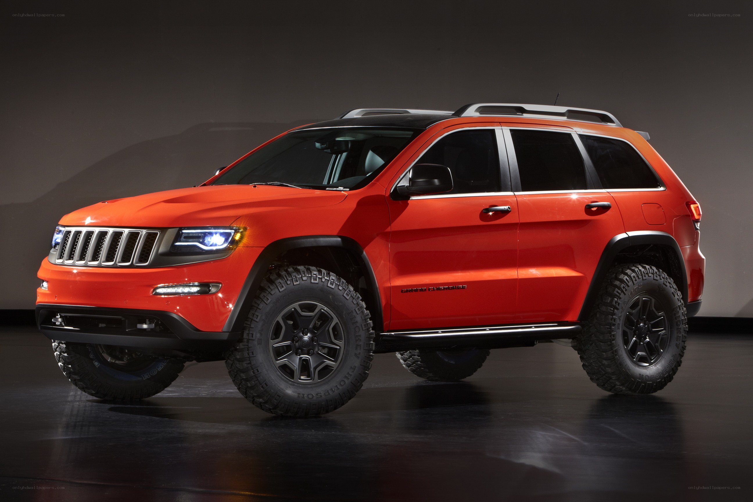 Orange Jeep Grand Cherokee