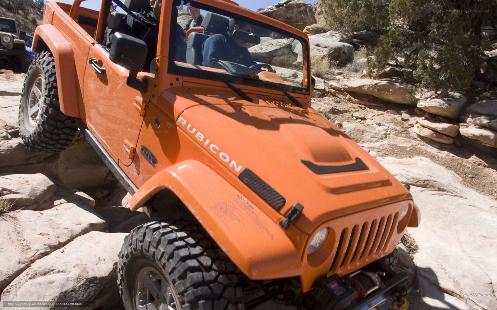 Orange Jeep Rubicon Off-Roading