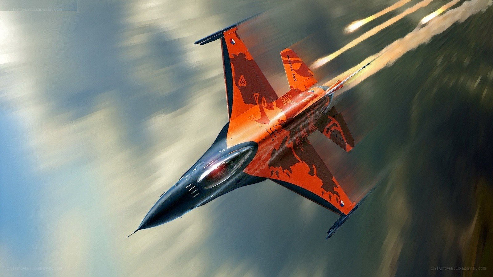 orange jet fighter in flight