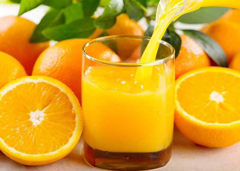 Orange Juice Being Poured — Fresh
