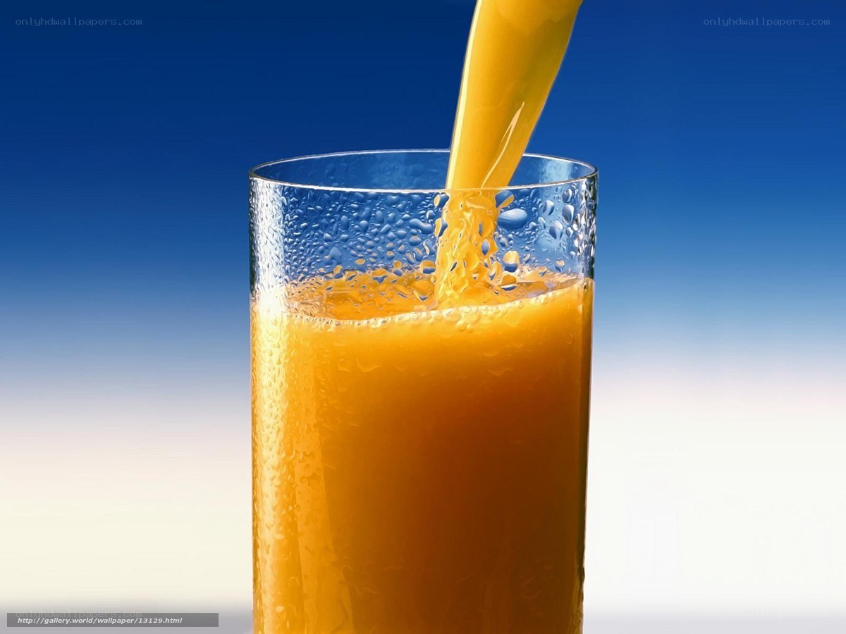 orange juice being poured