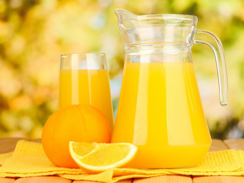 Orange Juice in Pitcher — Yellow