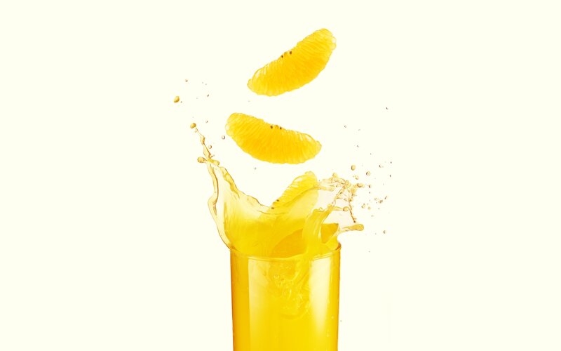 orange juice splash with slices