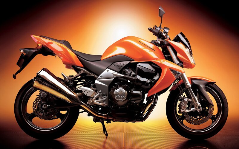 Orange Kawasaki motorcycle