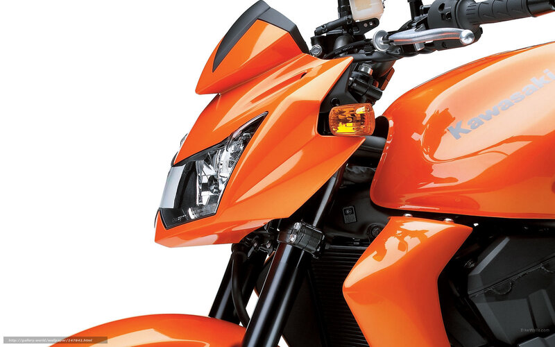 orange kawasaki motorcycle front