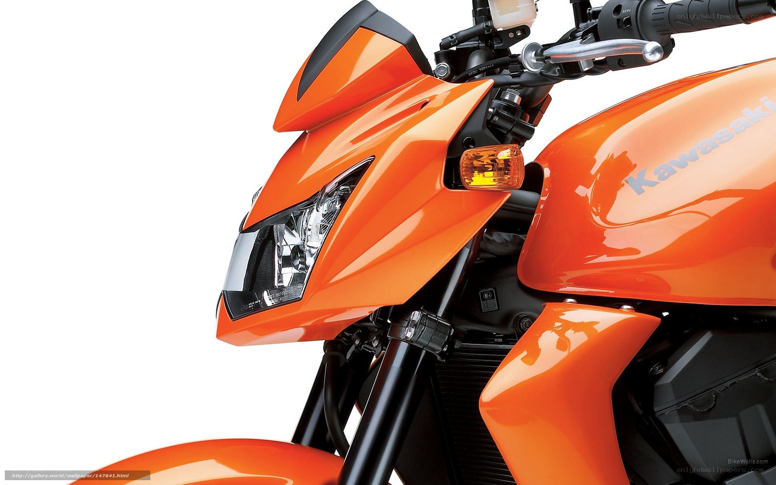 orange kawasaki motorcycle front