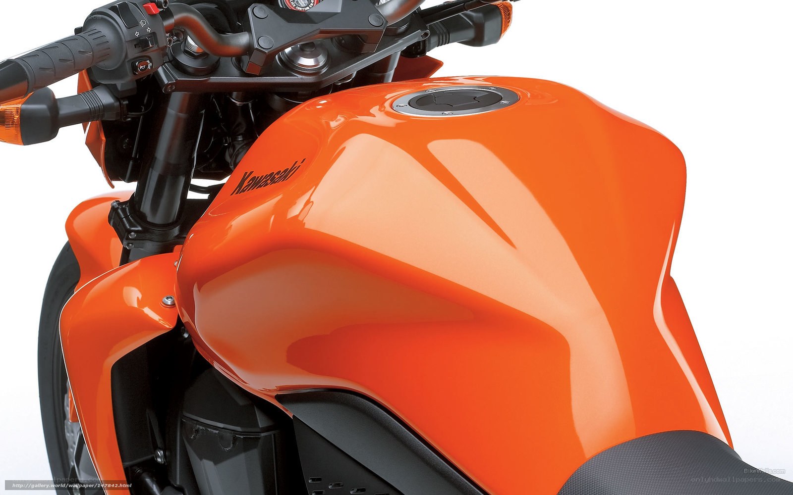 Orange Kawasaki motorcycle fuel tank