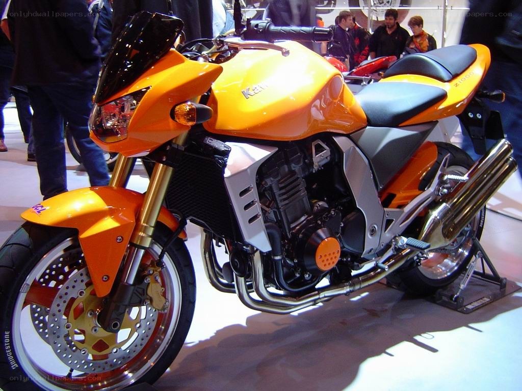 Orange Kawasaki motorcycle on display