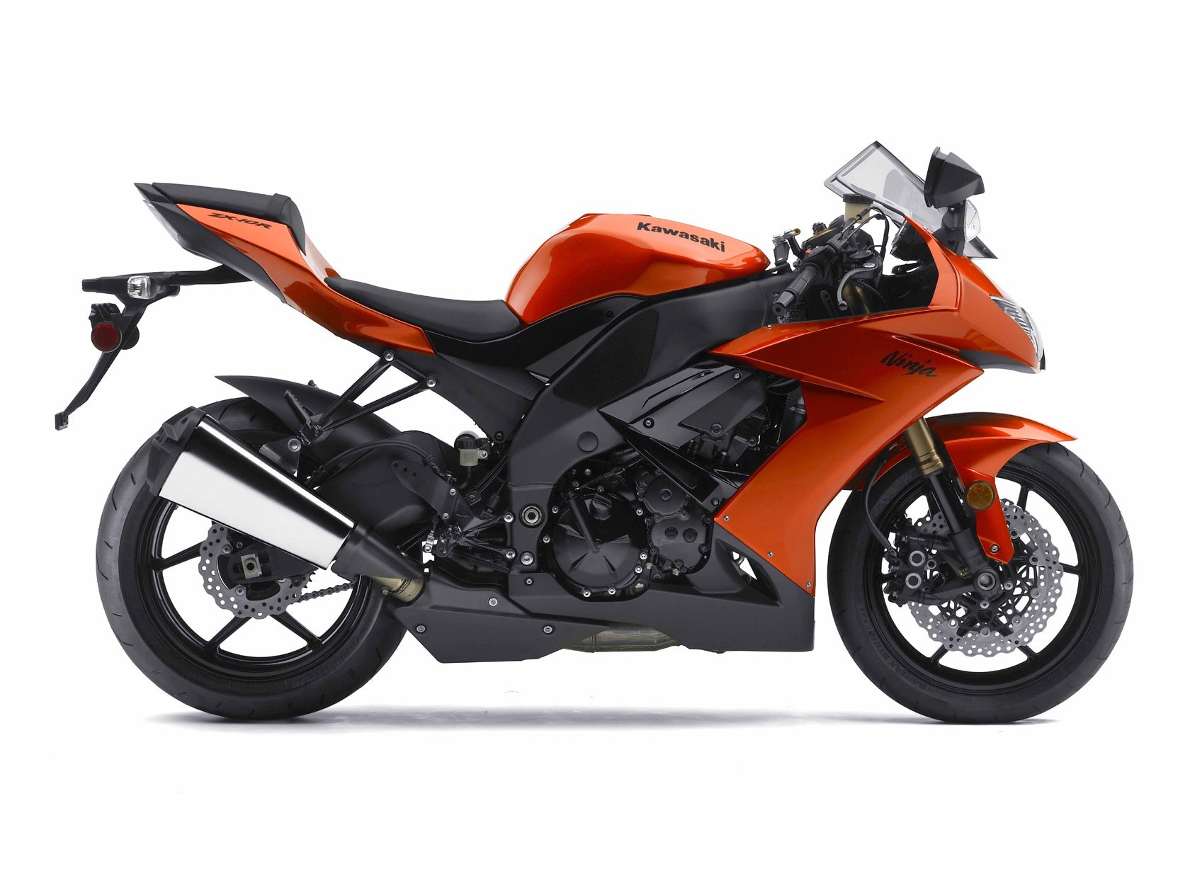 orange kawasaki ninja motorcycle