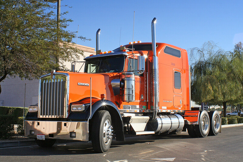 orange Kenworth semi-truck