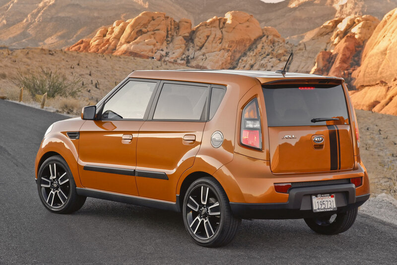 Orange Kia Soul on desert road