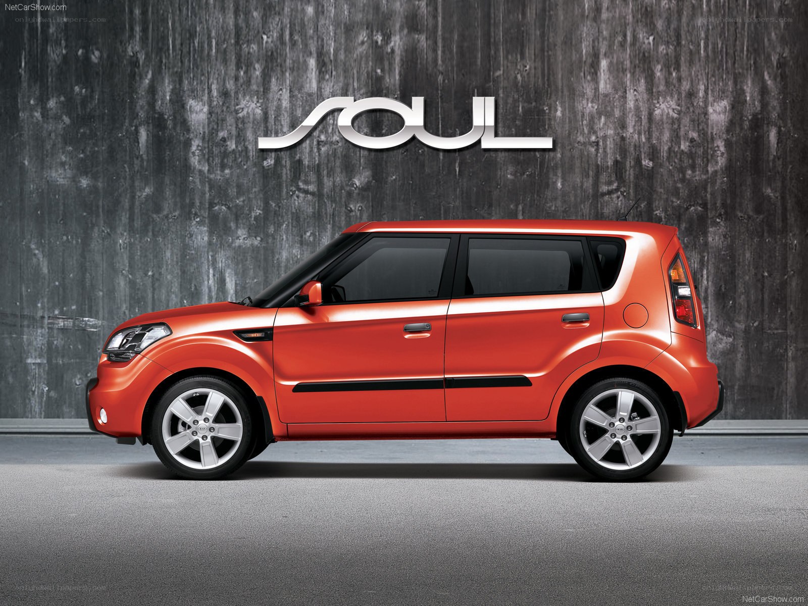 Orange Kia Soul side profile