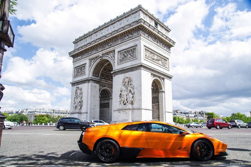 Orange Lamborghini at Arc de Triomphe