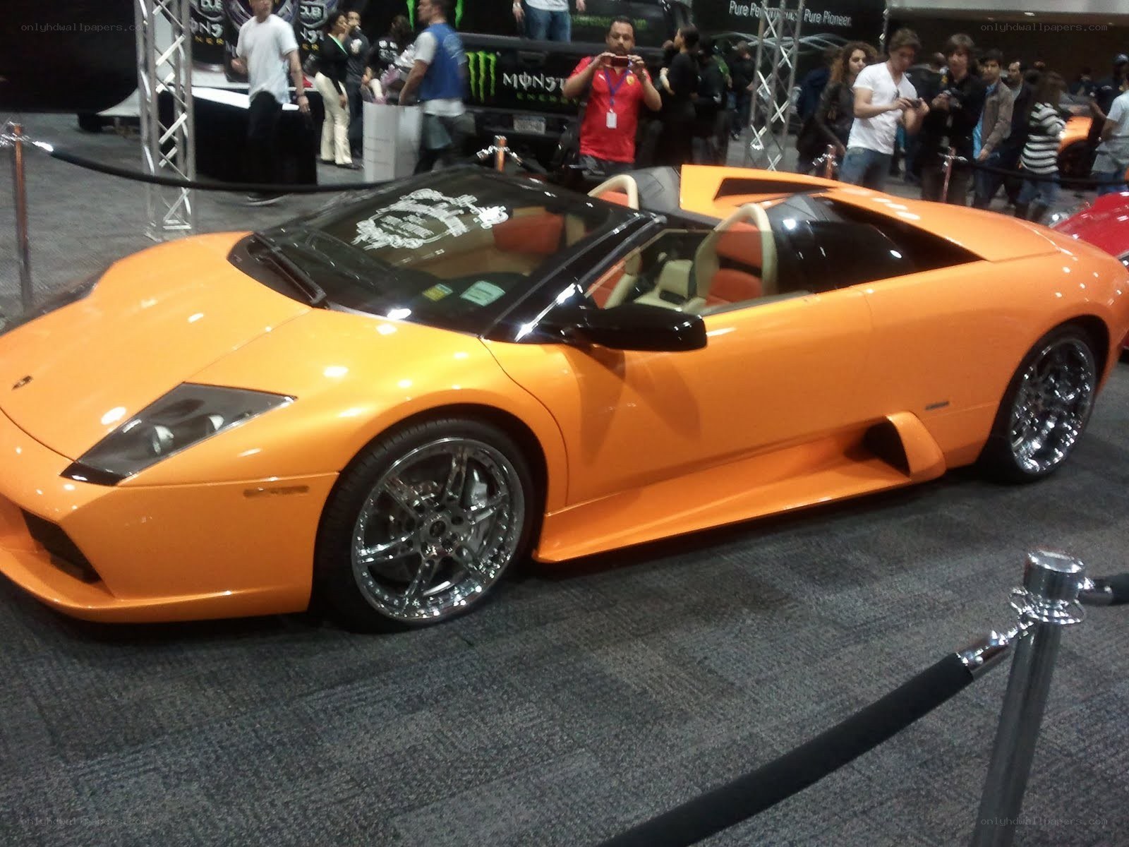 Orange Lamborghini at auto show