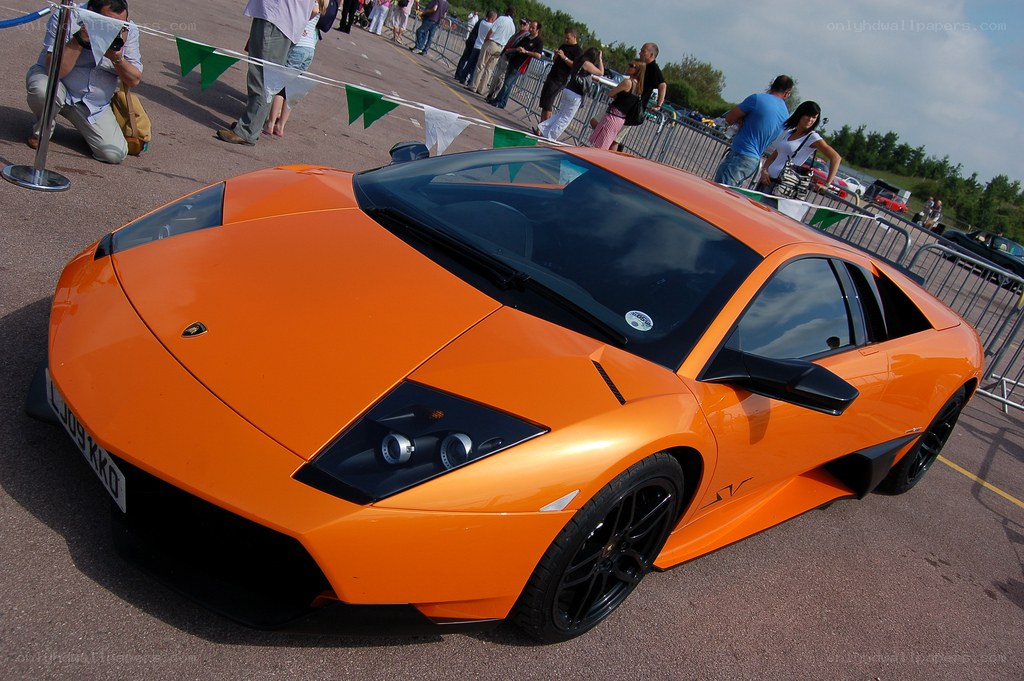 Orange Lamborghini at car show