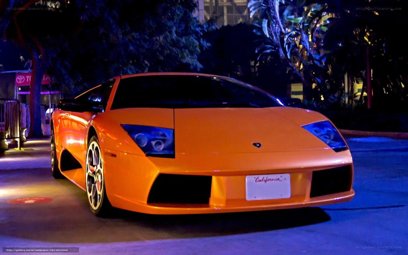 Orange Lamborghini at night