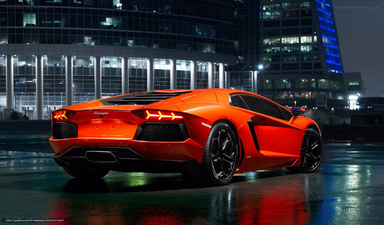 Orange Lamborghini at night