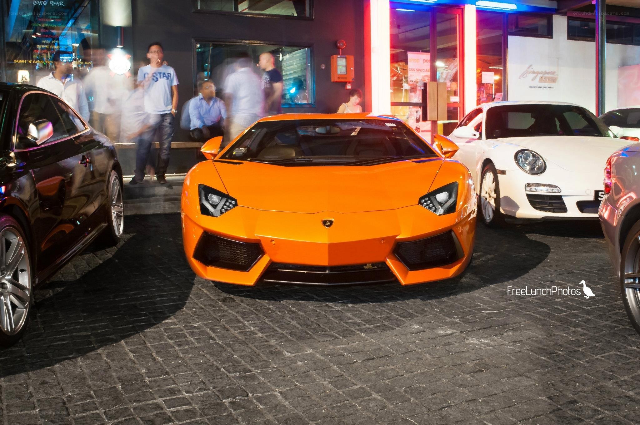 Orange Lamborghini at night