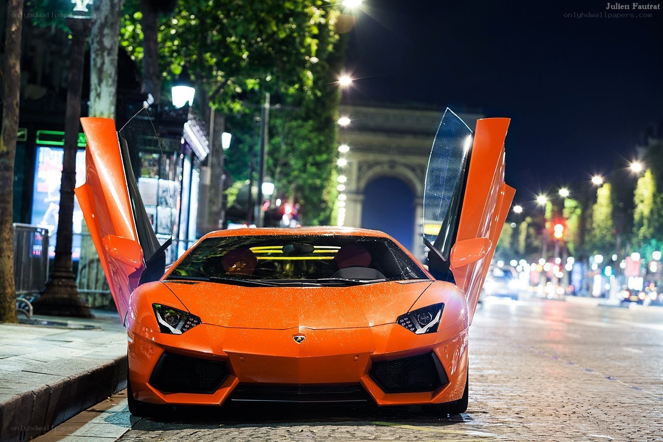 Orange Lamborghini at night