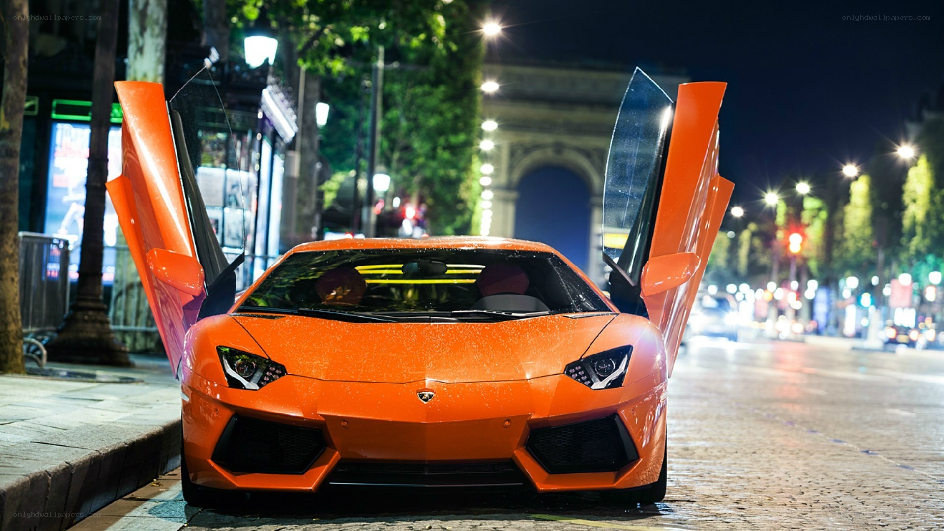 Orange Lamborghini at night