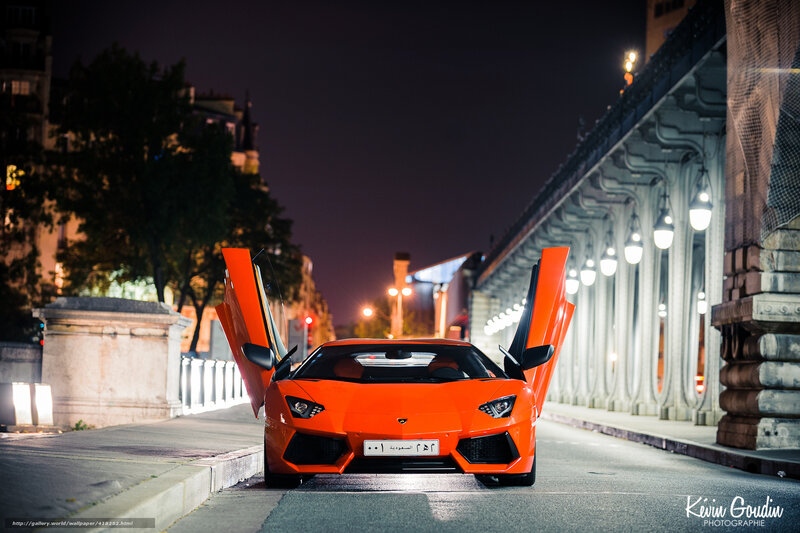 Orange Lamborghini at night