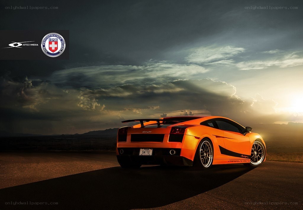 Orange Lamborghini at sunset