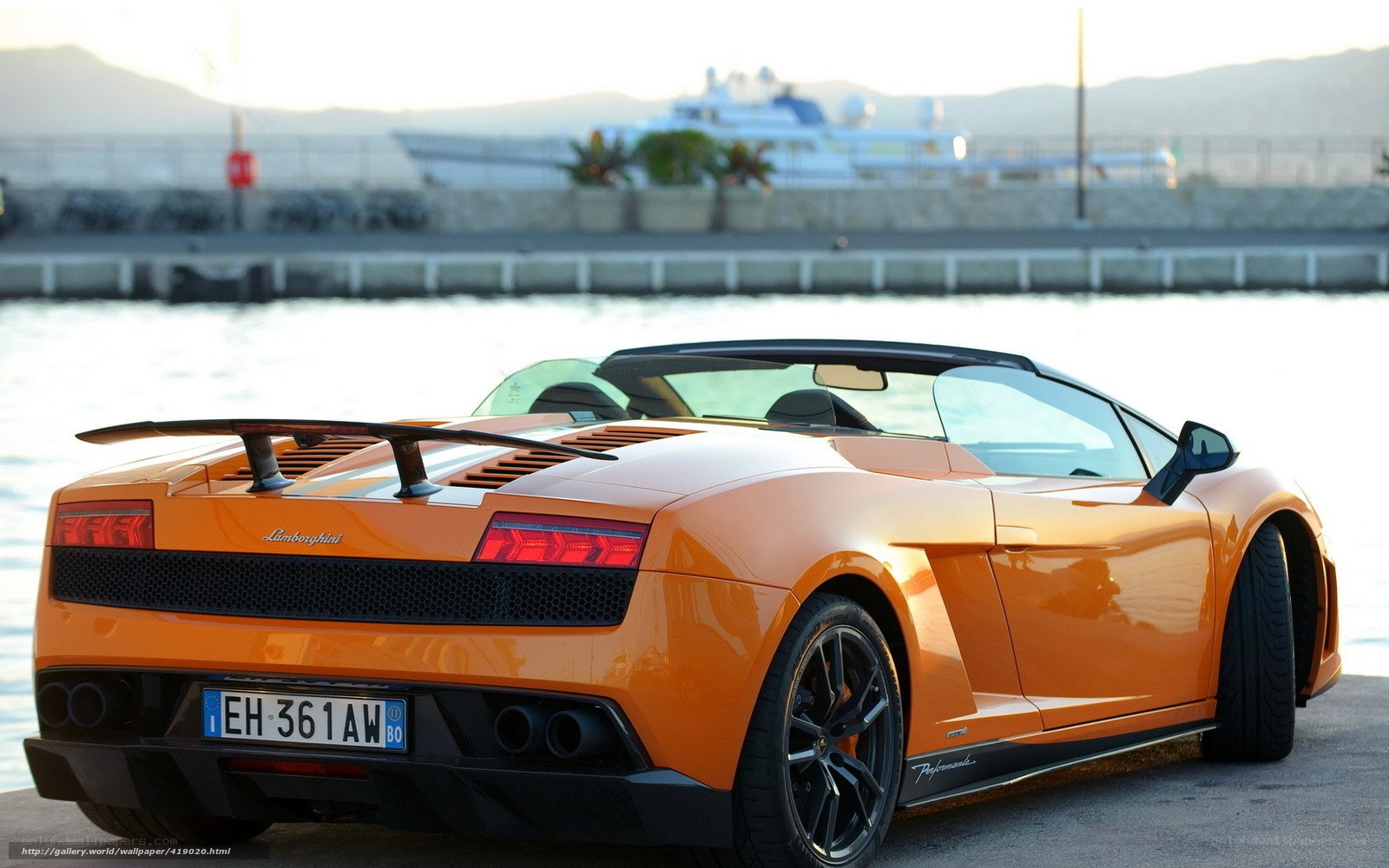 Orange Lamborghini at the harbor