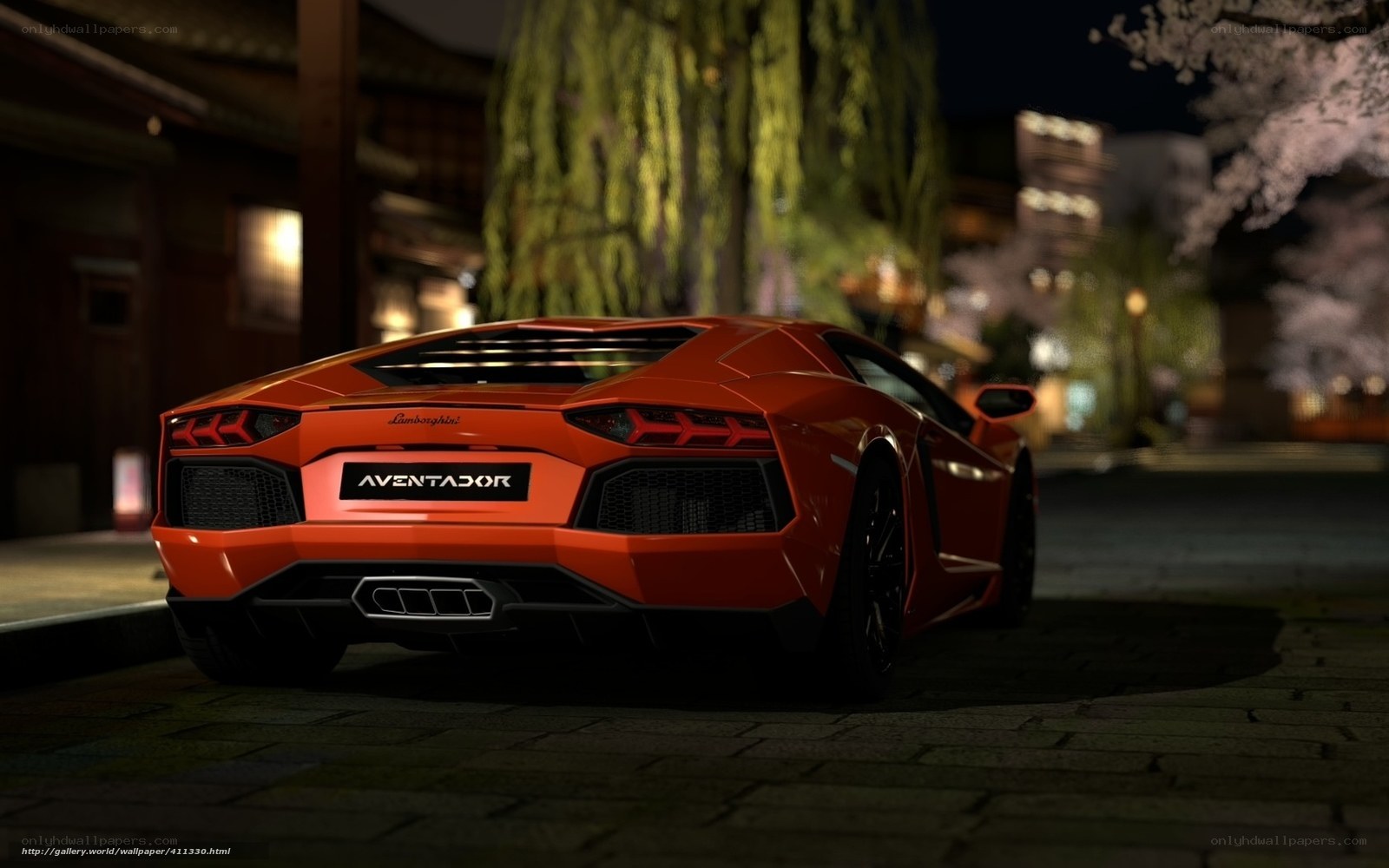 Orange Lamborghini Aventador at night