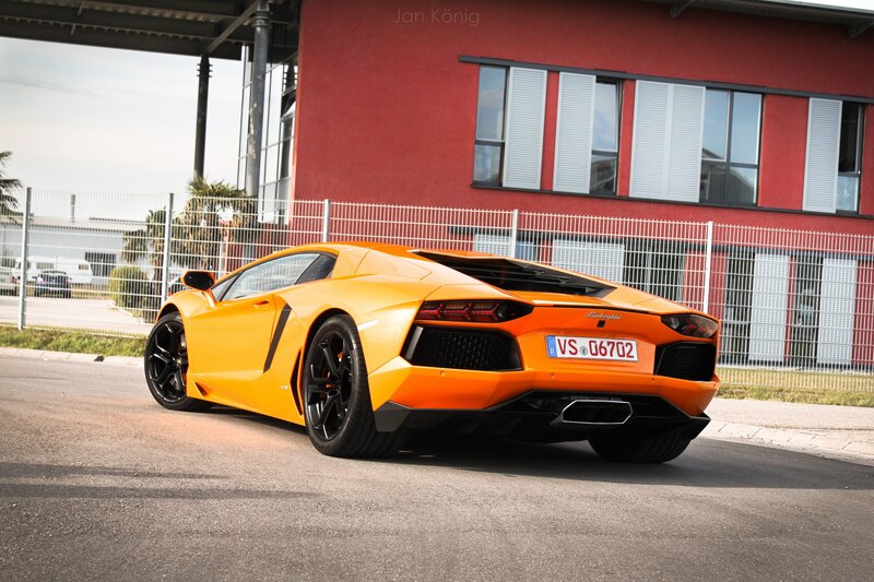 Orange Lamborghini Aventador — Dramatic, Afternoon, Photograph, Building, Fence