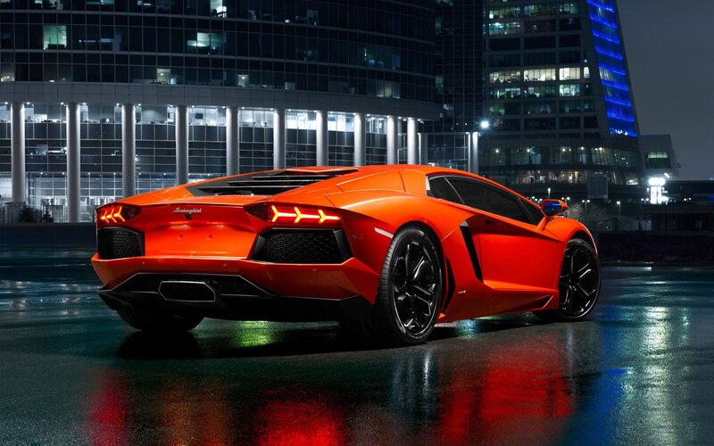 Orange Lamborghini Aventador — Dramatic, Night, Photograph, Car, Building, Wet Pavement