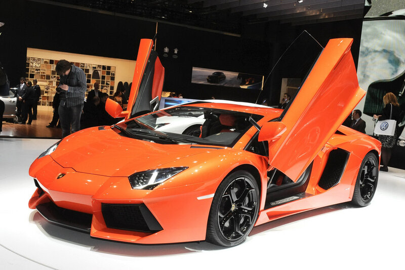 Orange Lamborghini Aventador — Showroom, Photograph, People