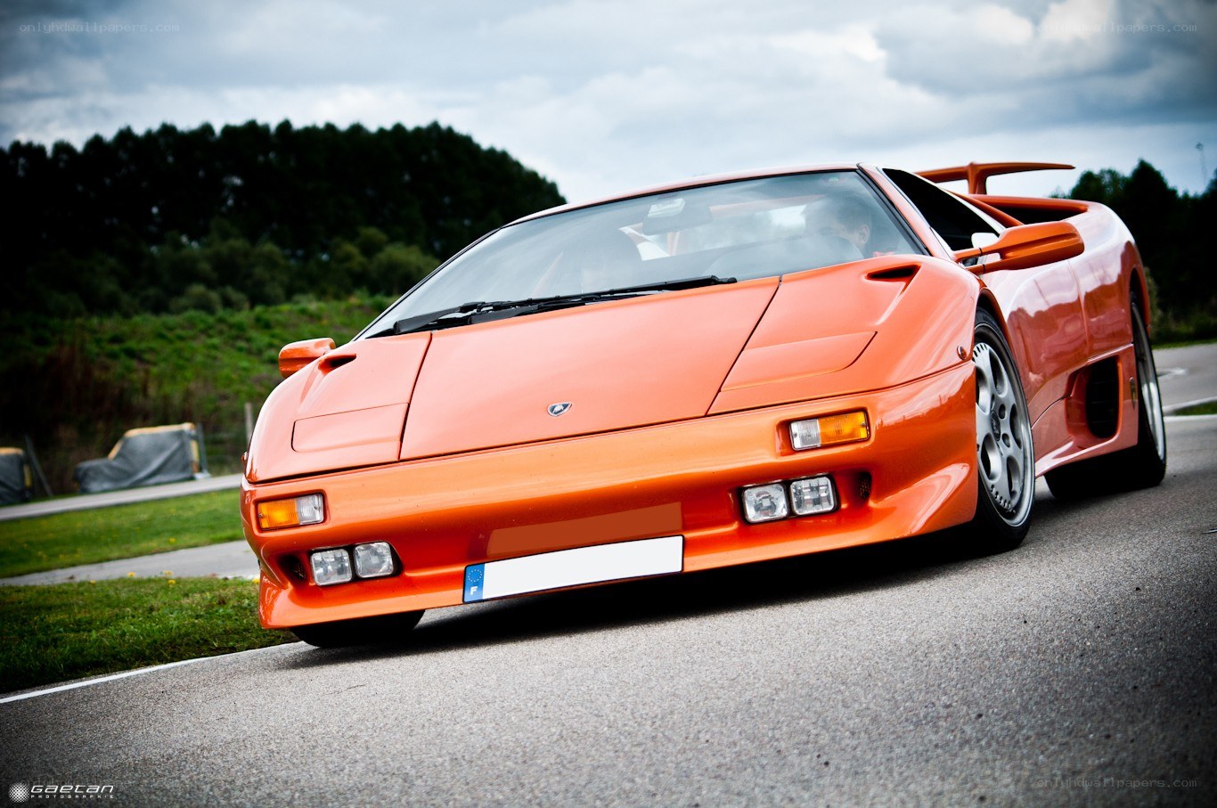 orange Lamborghini Diablo on track
