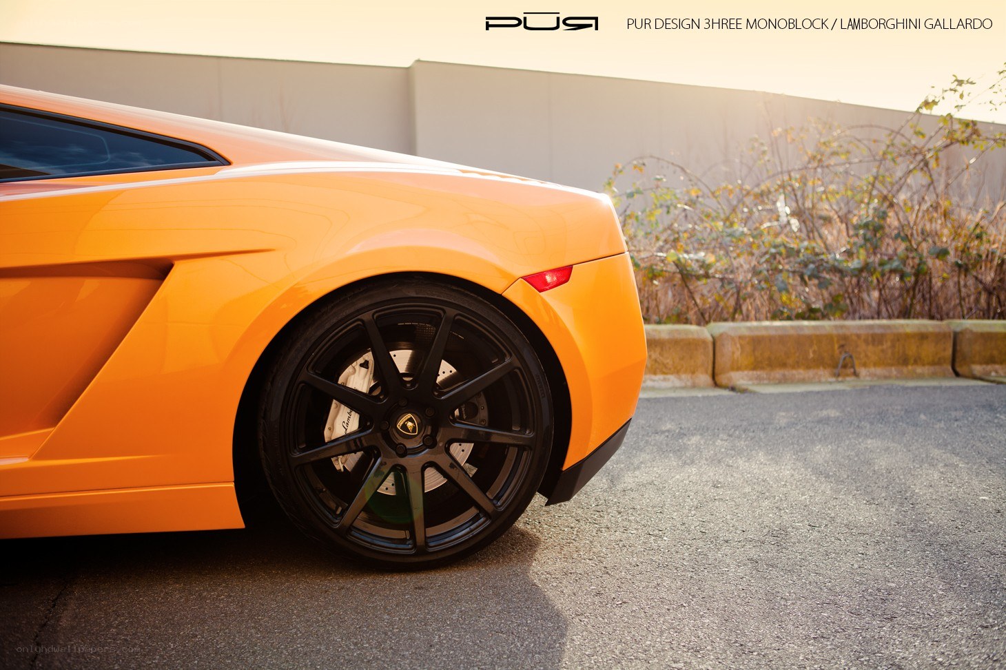 Orange Lamborghini Gallardo with custom wheels