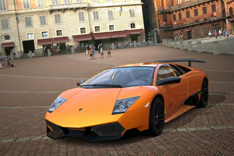 Orange Lamborghini in a European square