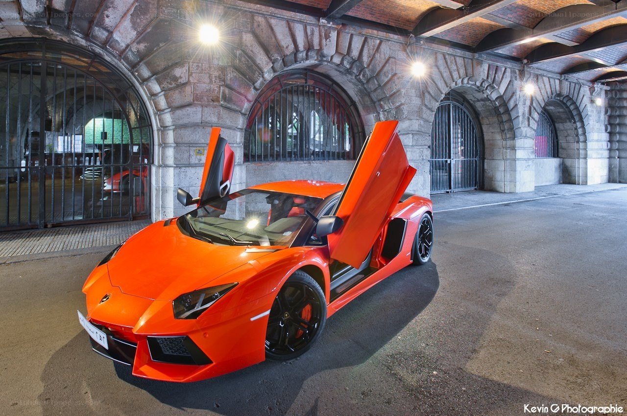 Orange Lamborghini in a tunnel
