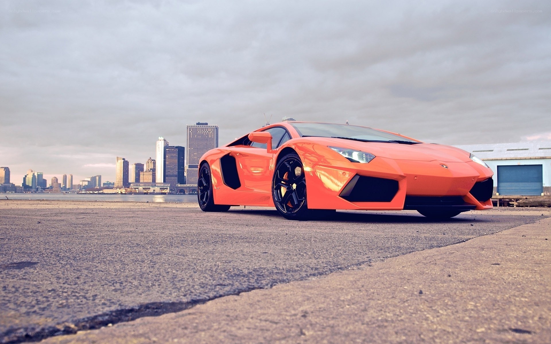 Orange Lamborghini in city