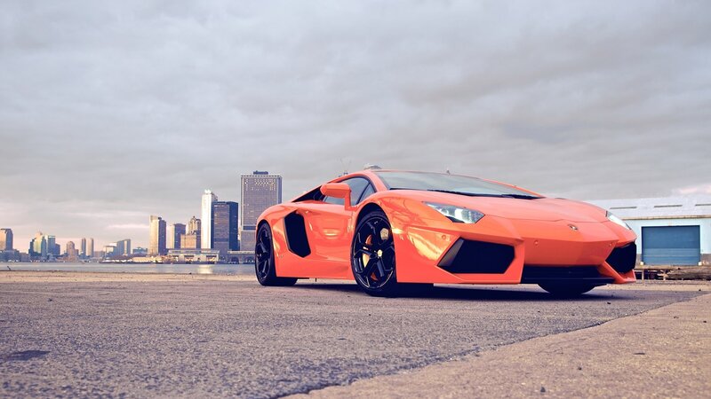 Orange Lamborghini in city