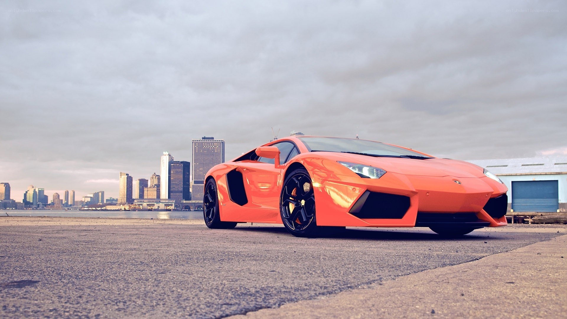 Orange Lamborghini in city