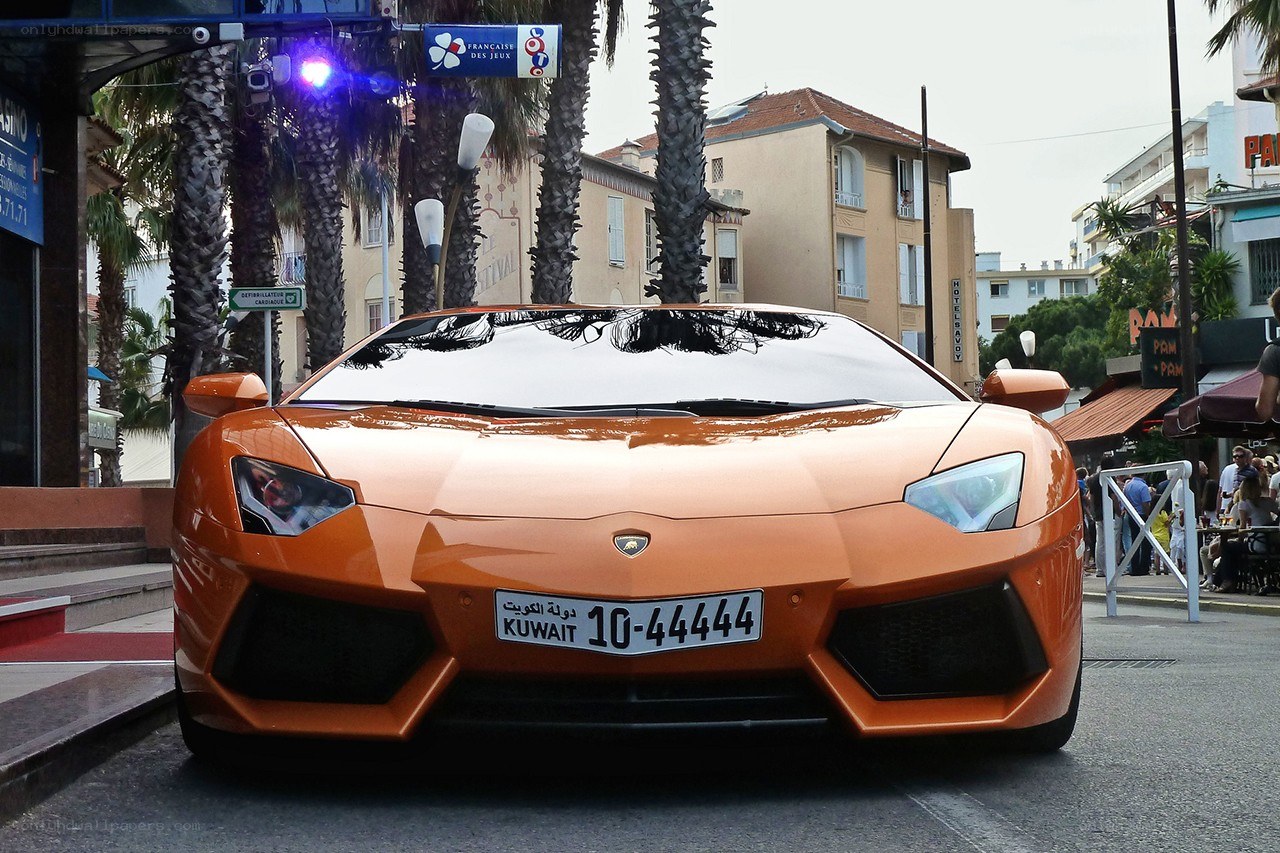 Orange Lamborghini in city