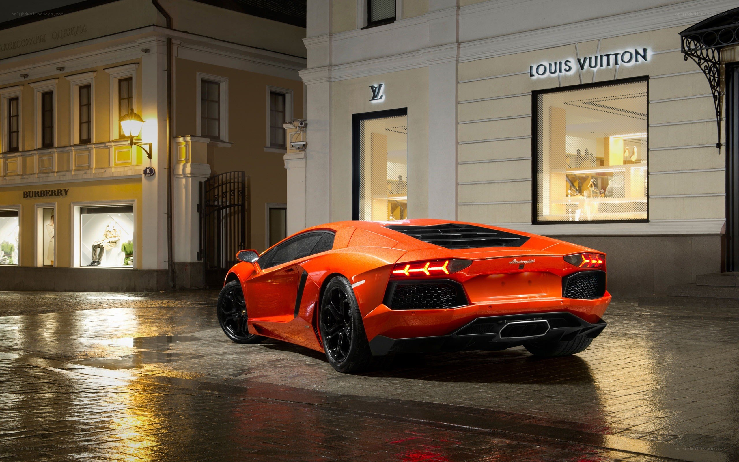 Orange Lamborghini in city