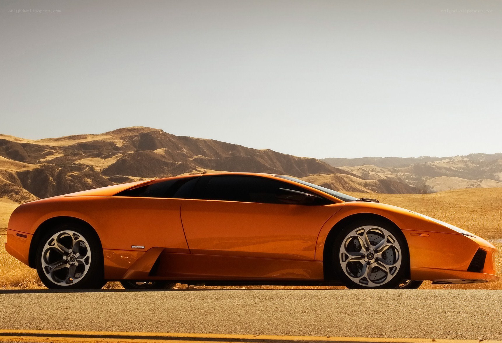 Orange Lamborghini in desert