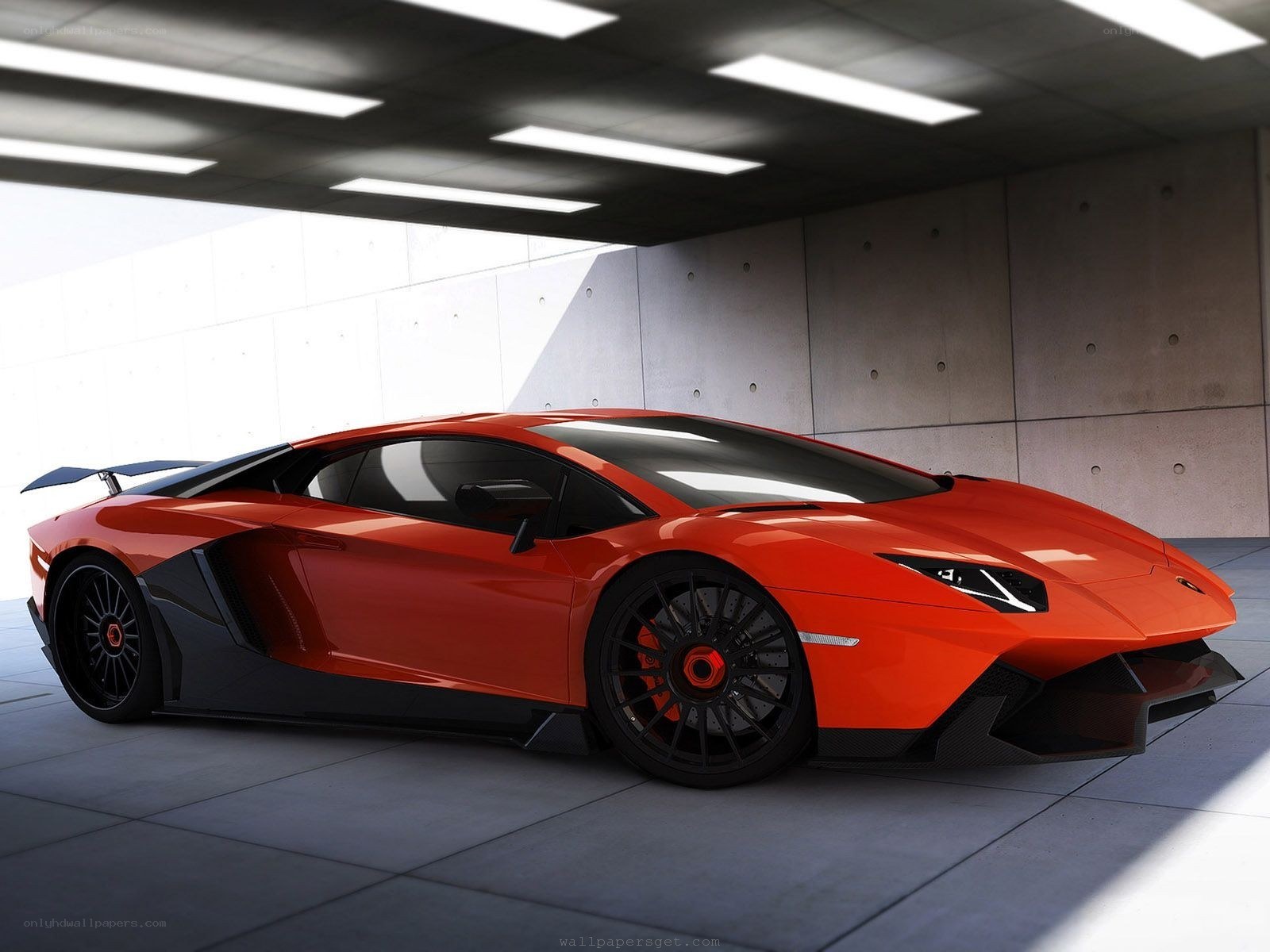 Orange Lamborghini in garage