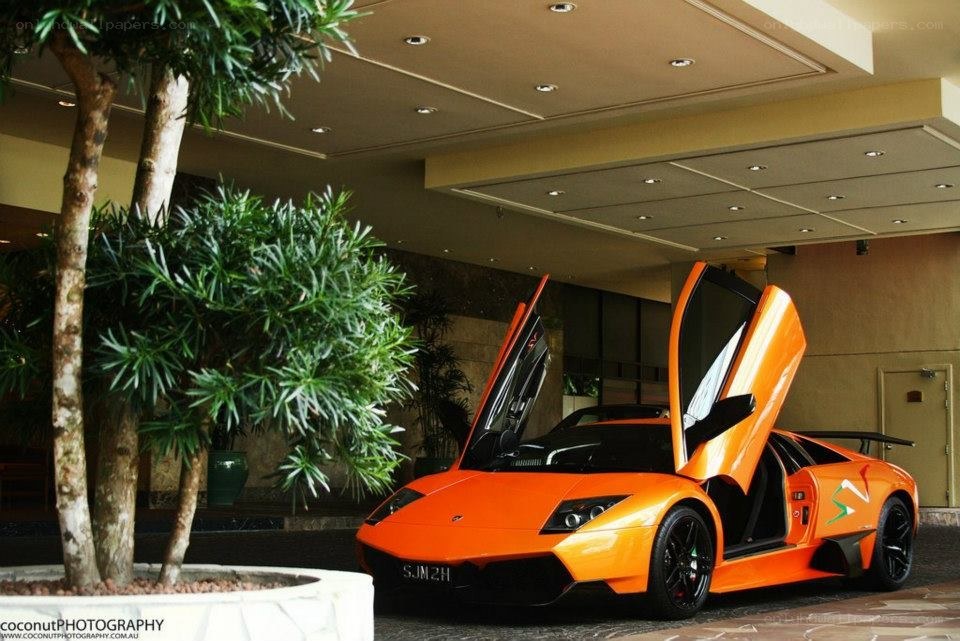 Orange Lamborghini in lobby